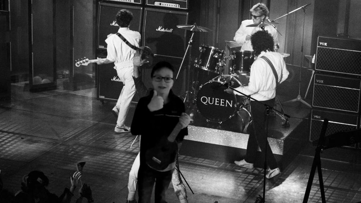 Stef performing as lead singer of Queen